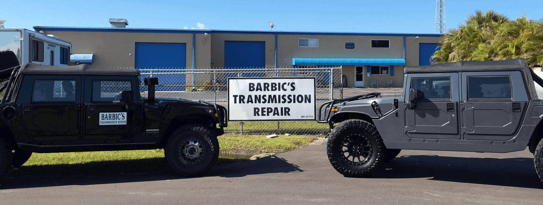 Barbic's Transmission Repair Barbic's Transmission Repair sign and Hummers